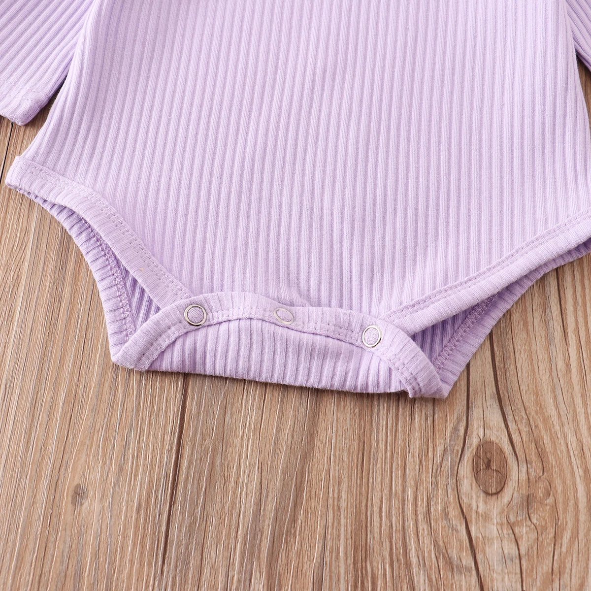 Candy ruffle onesie, newborn girl