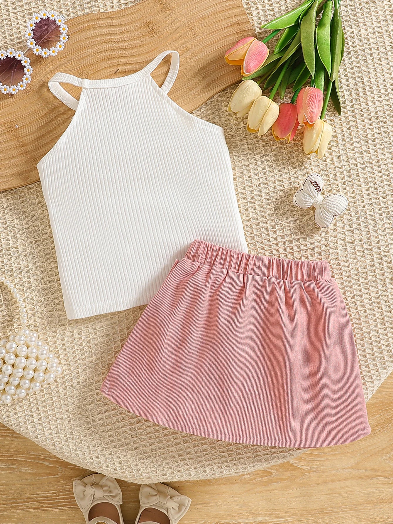 Fashion Baby Girl Two-Piece Set With Hanging Neck Sleeveless Top And Bow Decoration Short Skirt Set