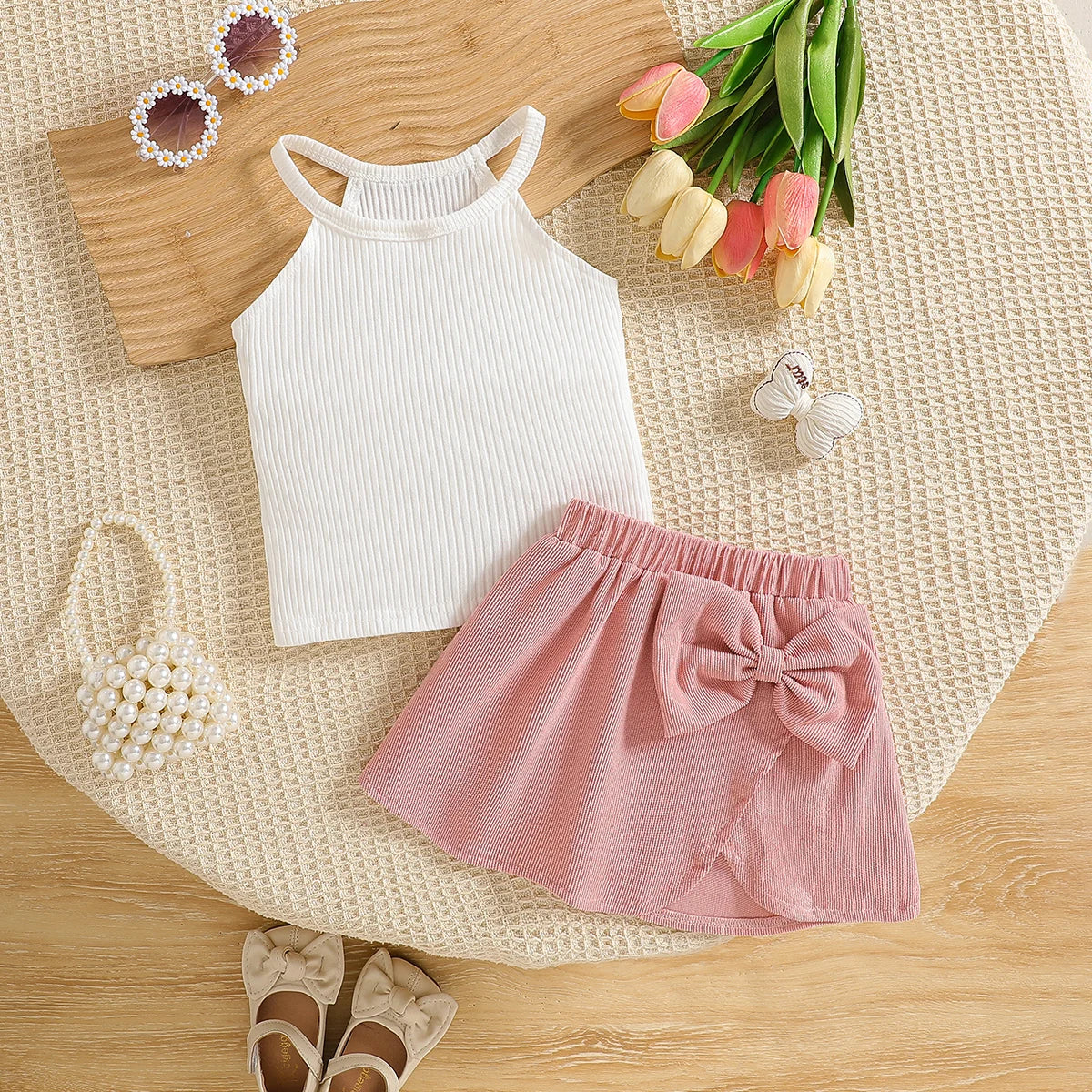 Fashion Baby Girl Two-Piece Set With Hanging Neck Sleeveless Top And Bow Decoration Short Skirt Set
